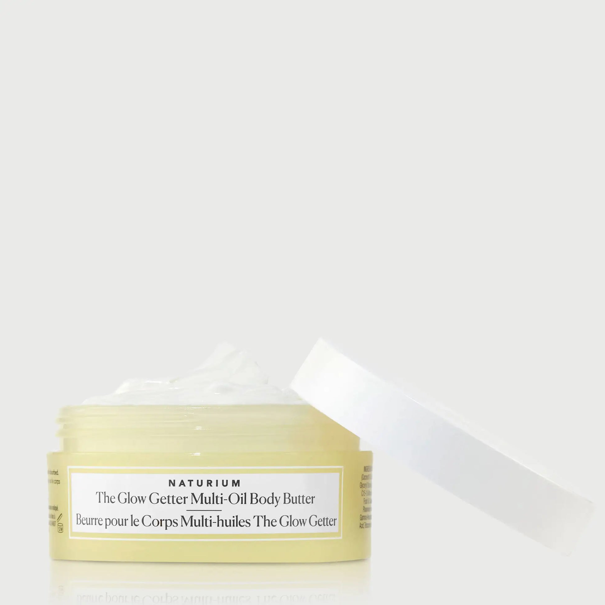 the-glow-getter-multi-oil-body-butter-travel-size-t0 NATR-40115_Glow-Getter-Body-Butter-Mini_front_capoff_bonebkgd.webp